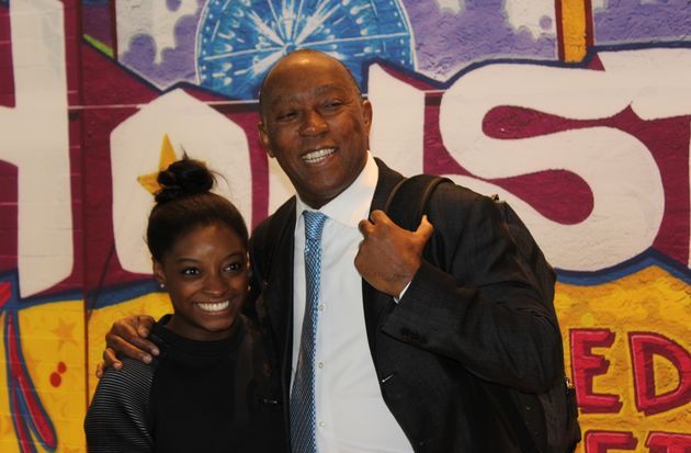 She Raised High the American Flag, Mayor Turner Carried Her Backpack